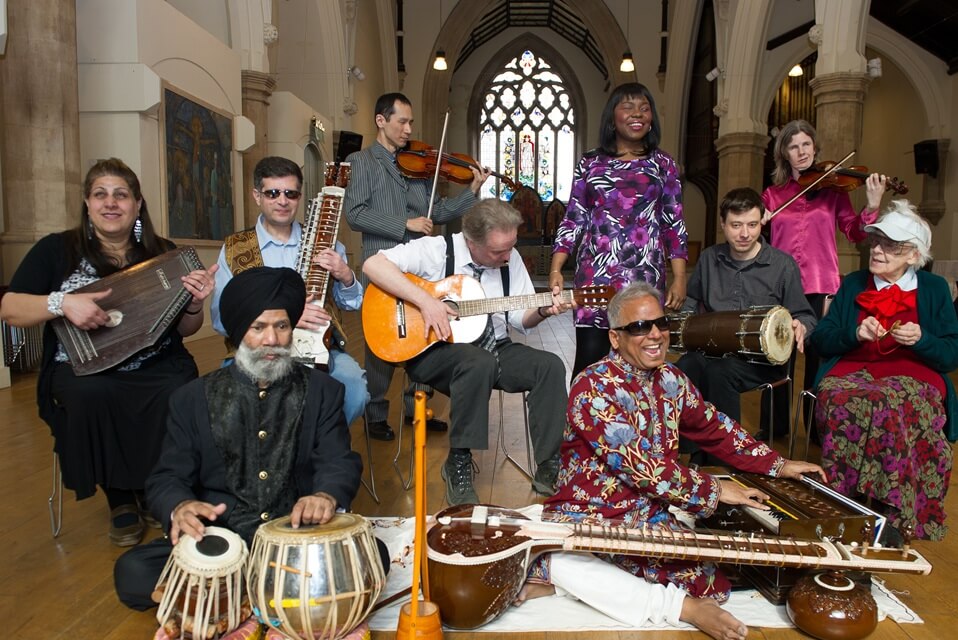 image of several performers seated with instruments