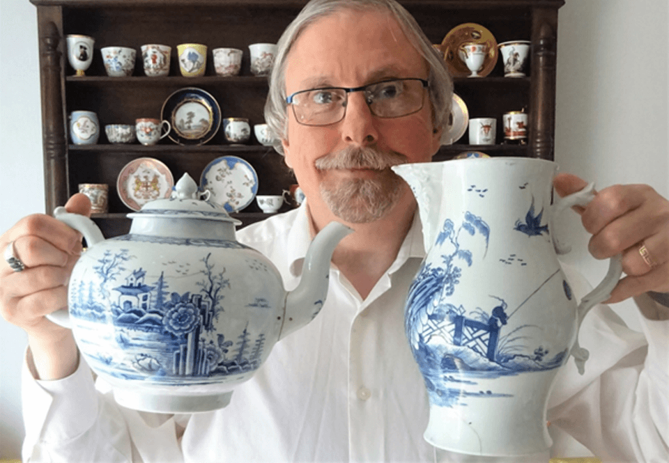 John Sandon holding pottery
