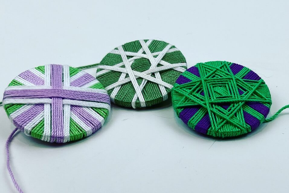 image of buttons in green white and purple cotton
