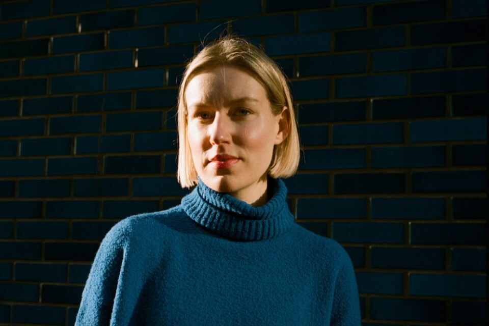 image-of-sophie-mackintosh-infront-of-brick-wall