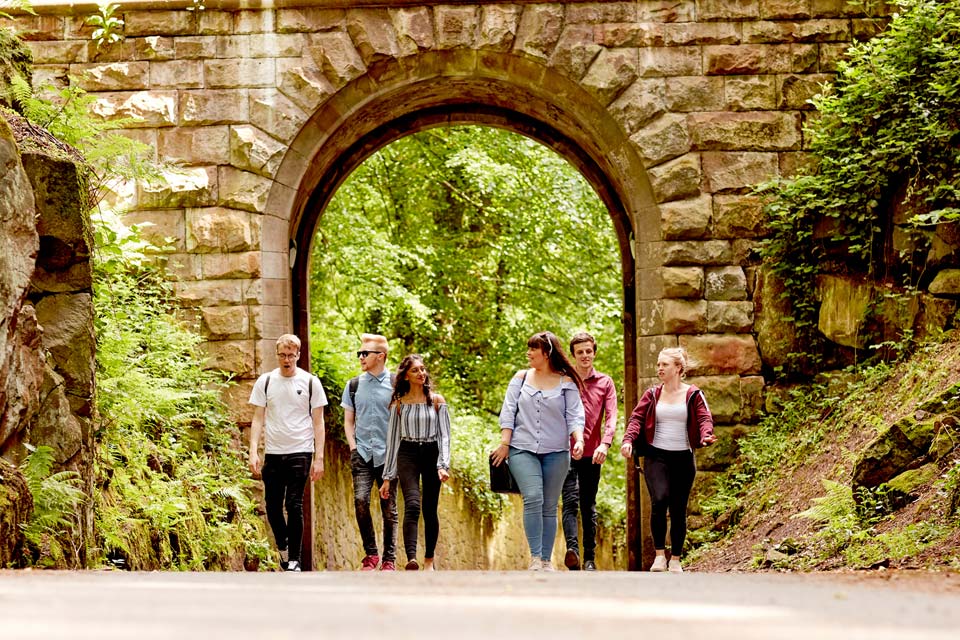 group of students walking on campus
