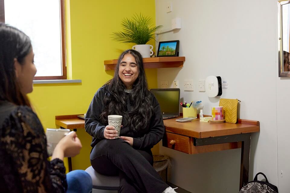 Student sitting in adapted room