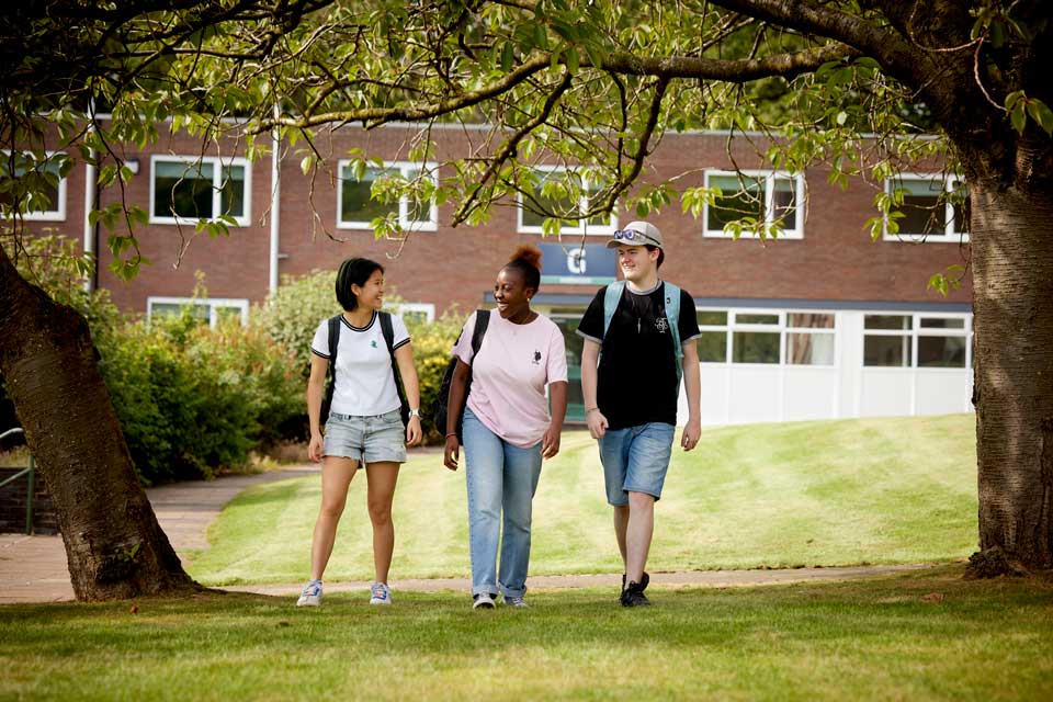 Students walking outside halls of residence
