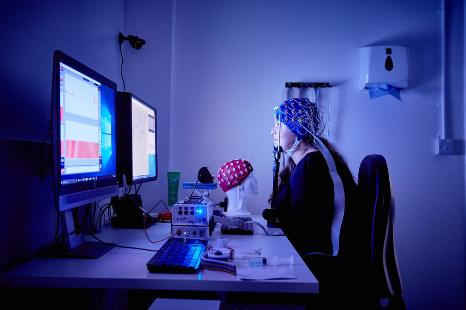 Student using Psychology equipment