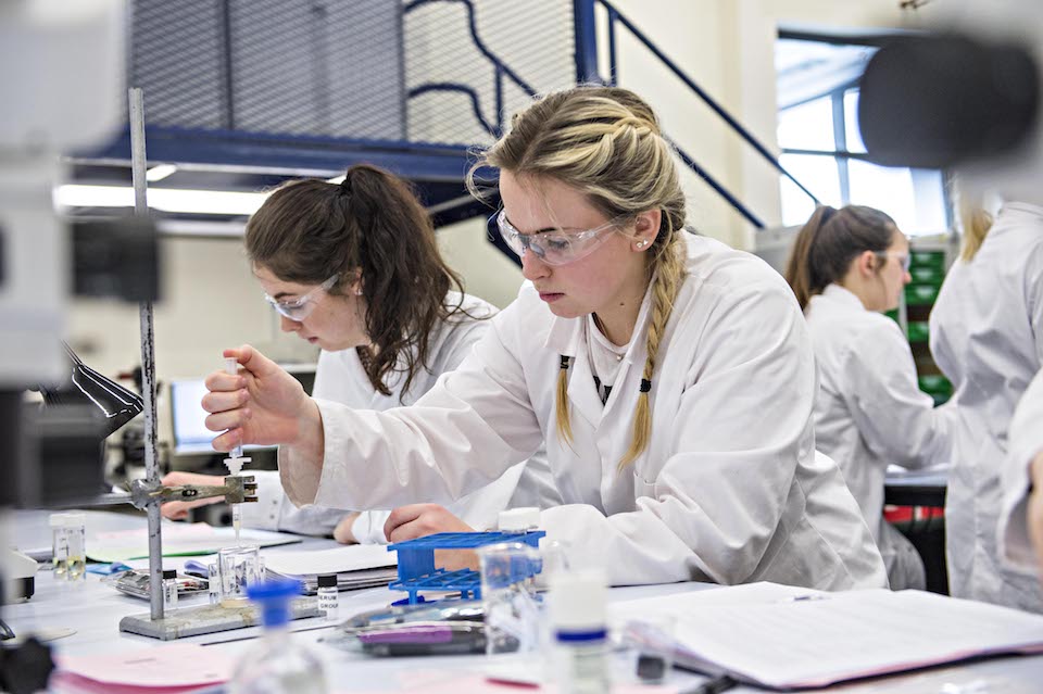 Keele students experimenting in a lab