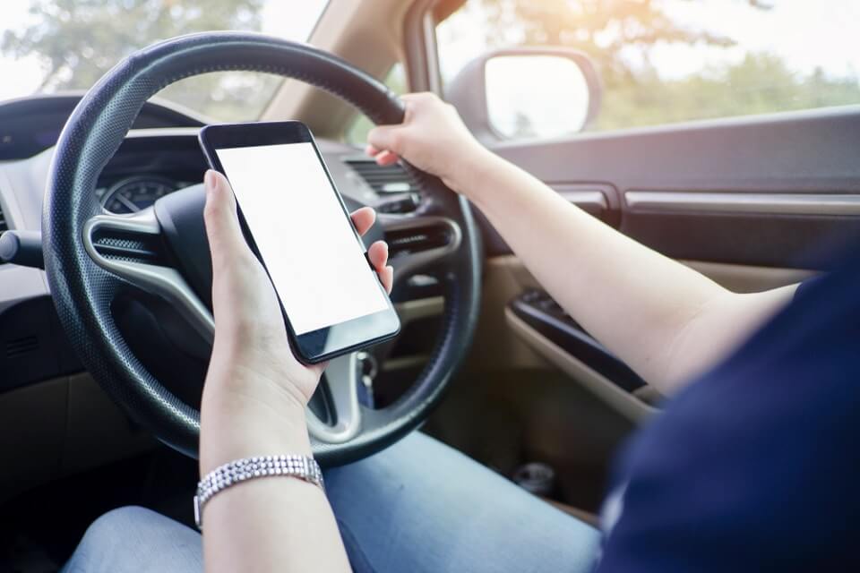 Keele research helps police tackle drivers using mobile phones in cars