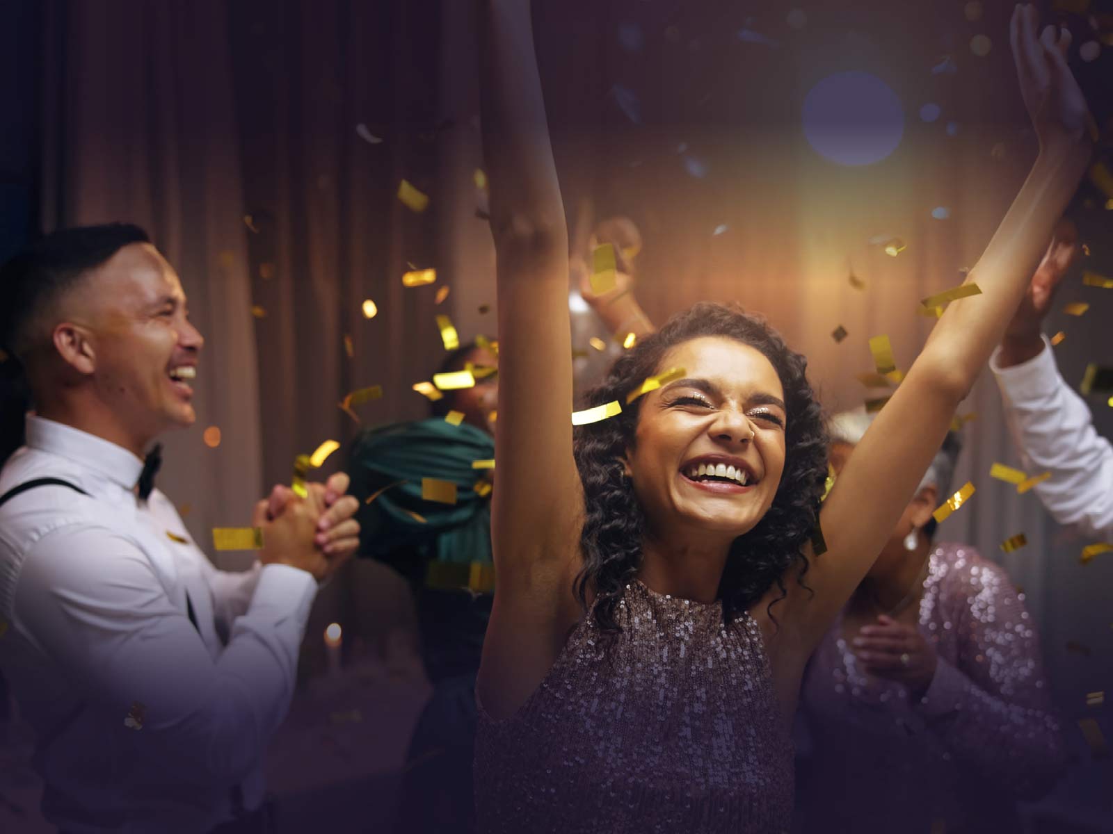People dancing and celebrating at a party