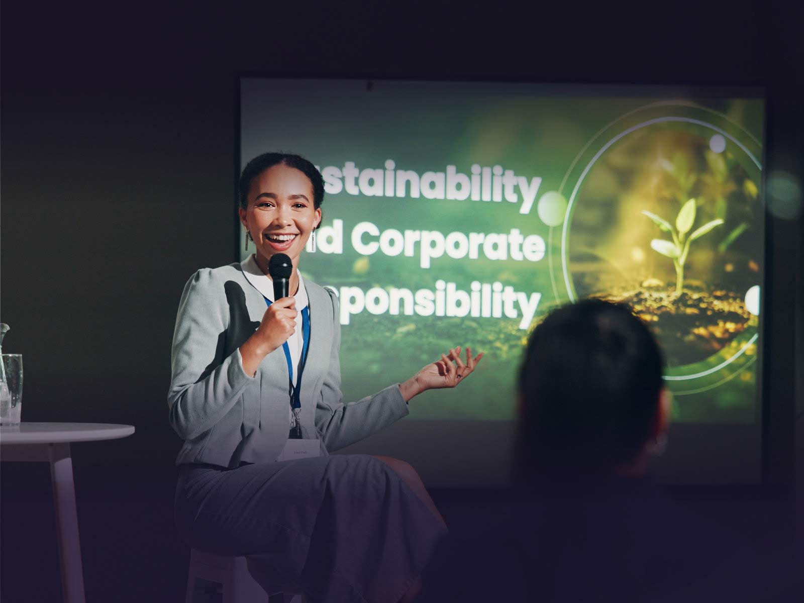 Speaker on stage at a conference