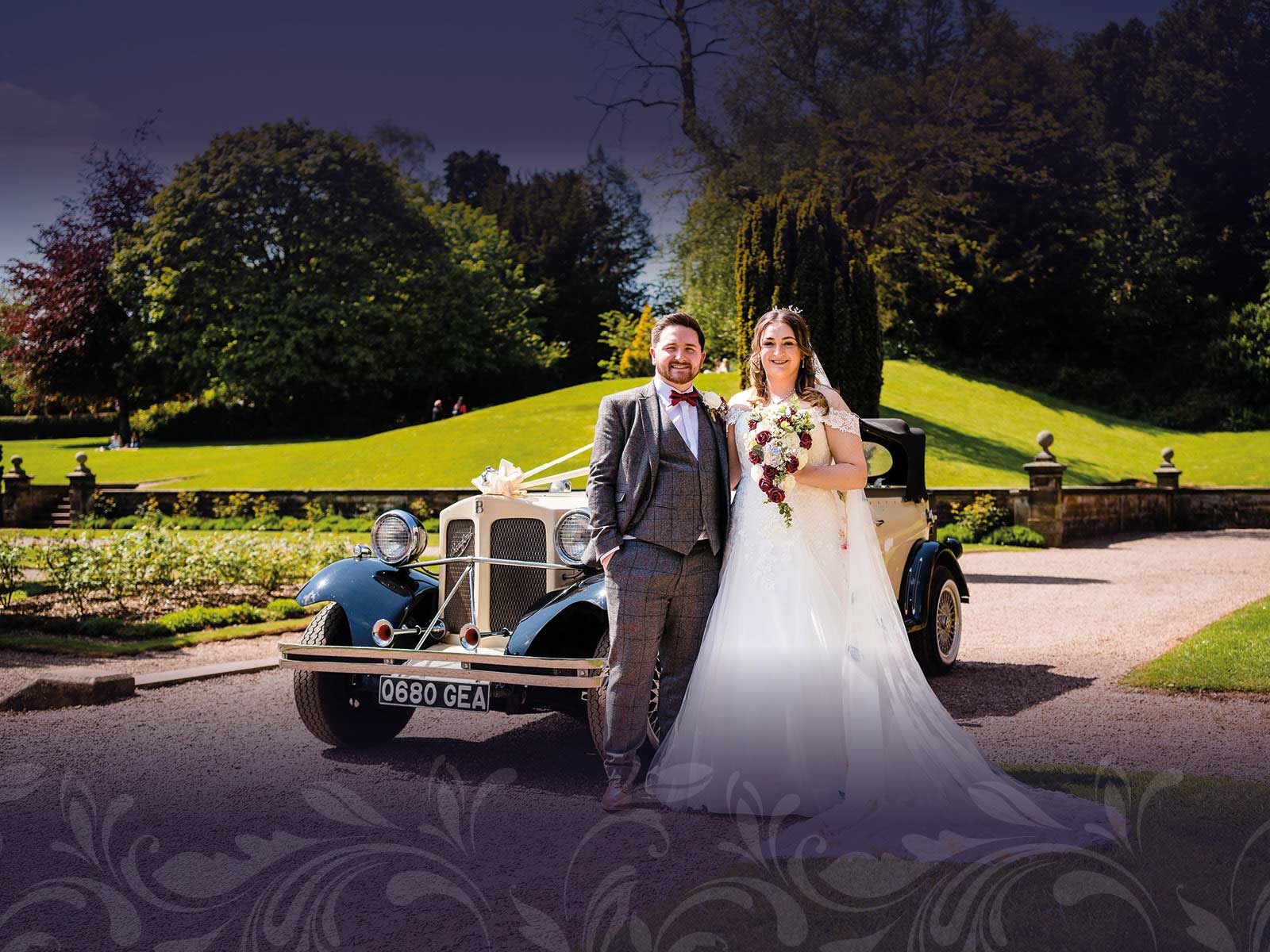 Bride and Groom in front of wedding car