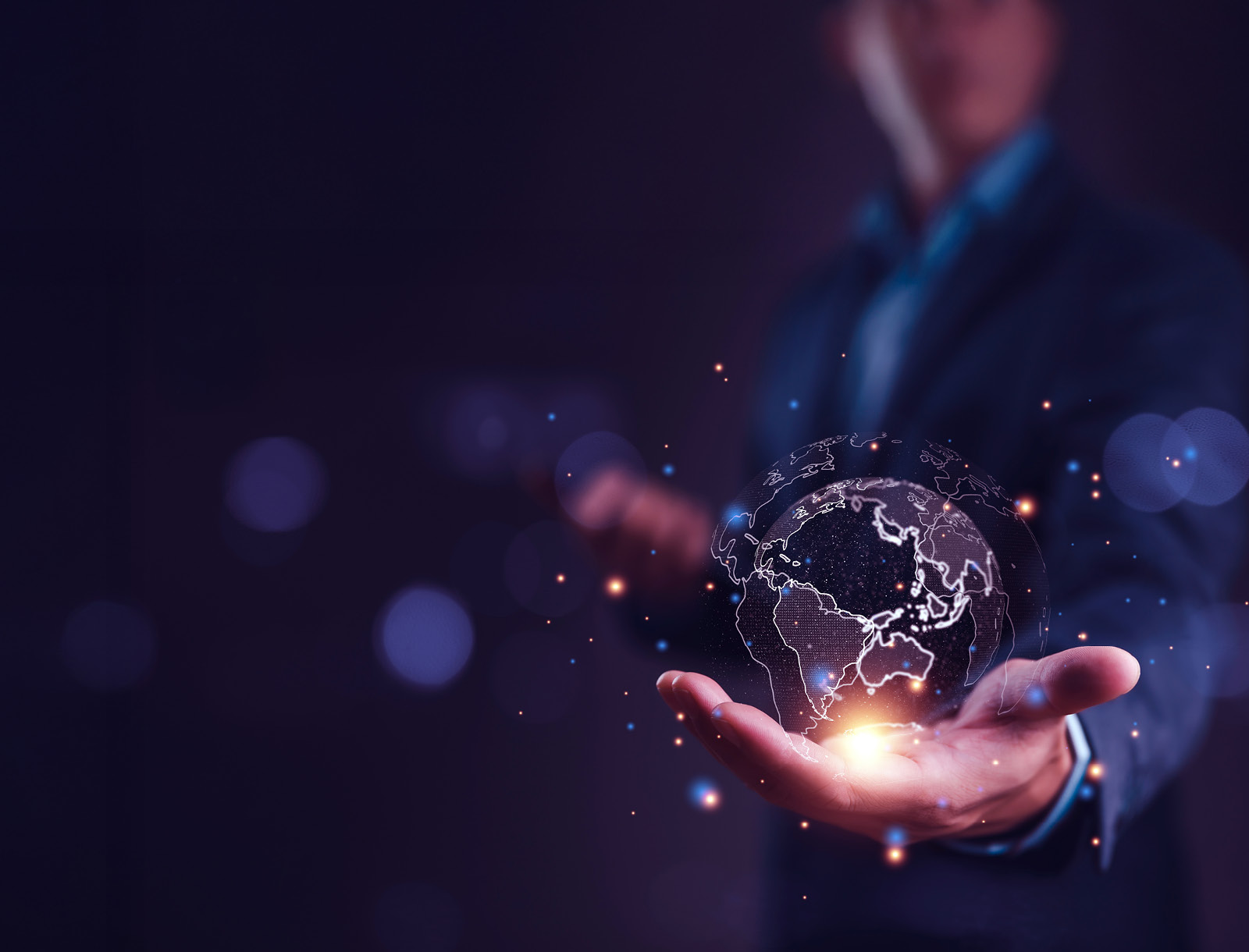 Glowing globe in the palm of a hand stylised graphic