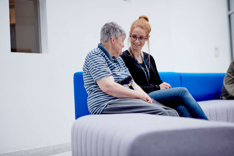 A Health and Social Care student at Keele University talking to a patient.