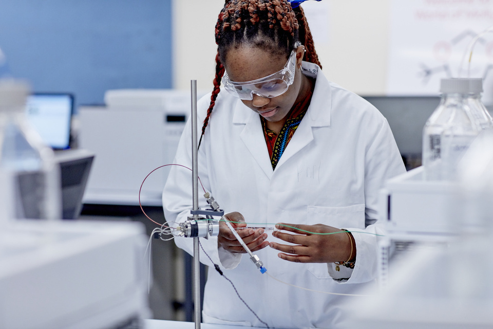 A Medicinal Chemistry student working in a laboratory at Keele University.