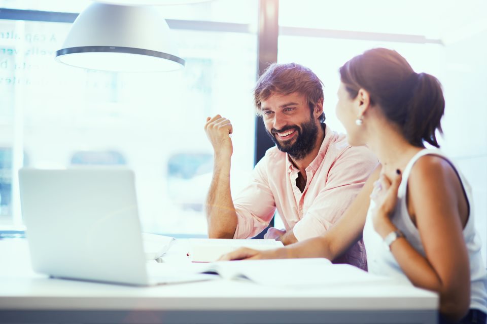 2 members of staff talking