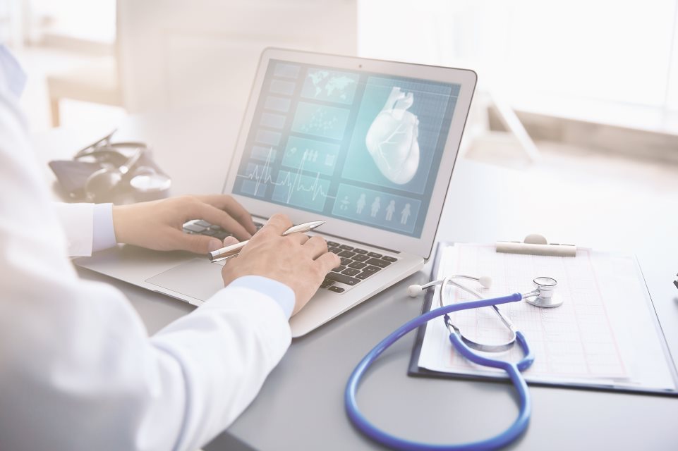 Doctor using a laptop