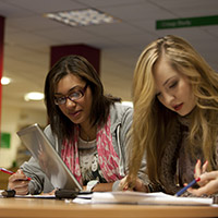 image of girls studying