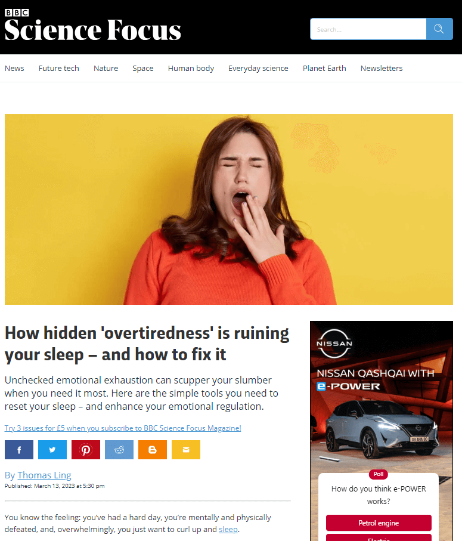 A screenshot of a news website featuring a photo of a woman yawning