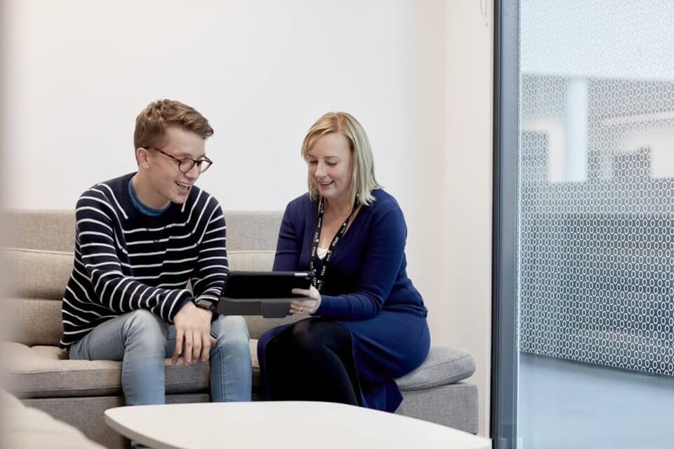 Student accessing support from support worker