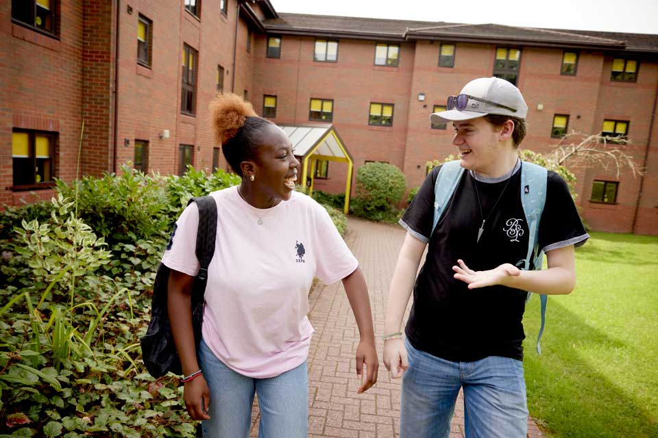 Students walking around Keele campus