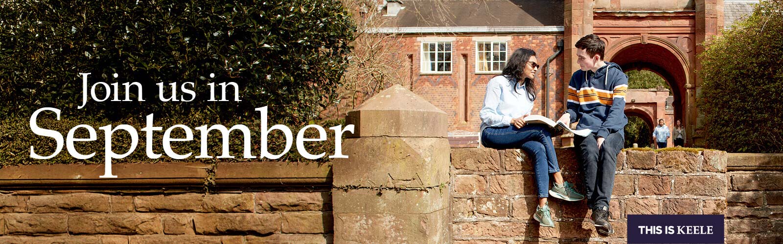 Two students sitting on a wall talking, with text overlay: 'Join us in September'
