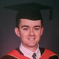 Daniel Murray in graduation cap and gown 