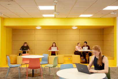 Students working in the social space in Chancellor's Building, Keele University
