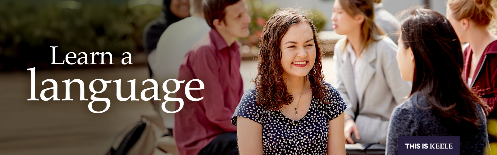 Picture of students sitting in Union Square on Keele campus.