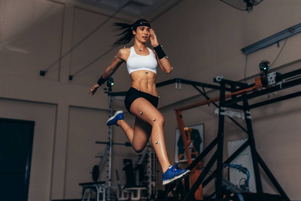 A woman on a running machine.