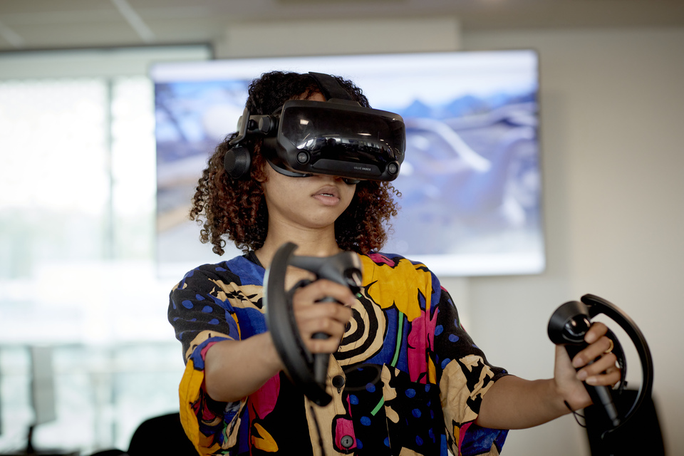 Computer Science student using VR equipment at Keele University 