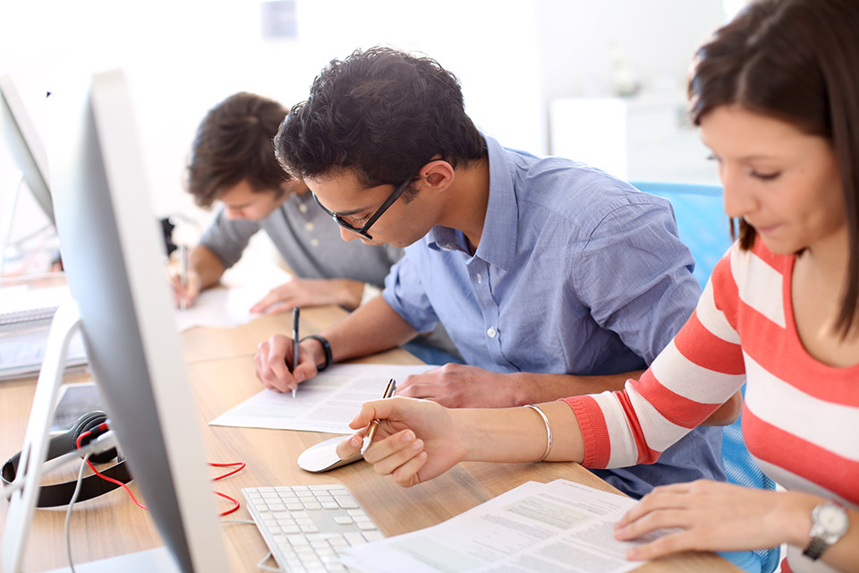 Students working and writing