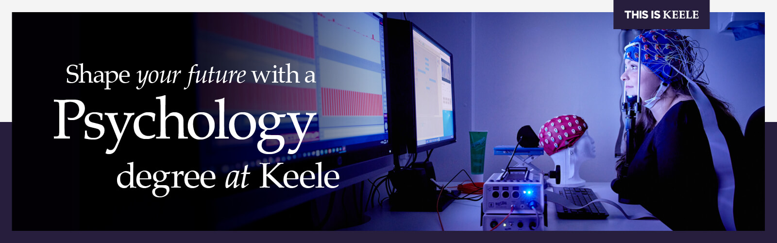 Psychology student working with EEG equipment in Keele laboratory