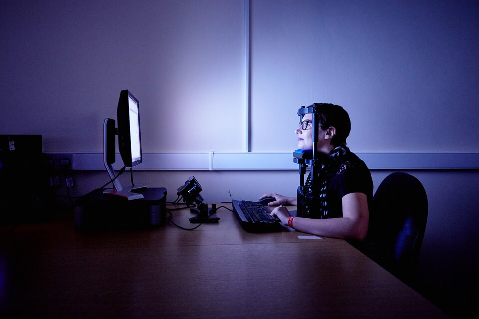 Keele Psychology with Sociology lecturer using eye tracking equipment in lab