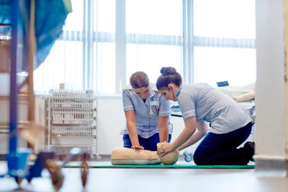 Student nurses undertaking a practical activity as part of their studies.