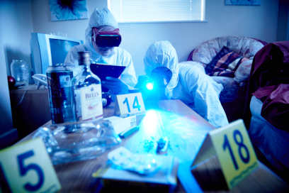 Students working in Keele's crime scene house on campus