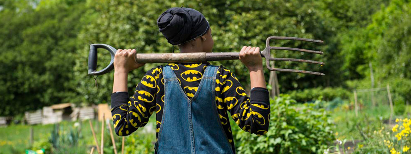 Girl with garden fork