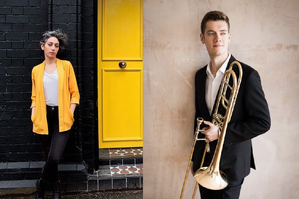 Photographic portrait of two musicians.